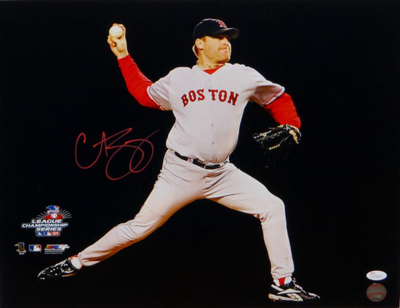 Curt Schilling Autographed In Red 16x20 Horizontal Pitching Photo- JSA W Auth