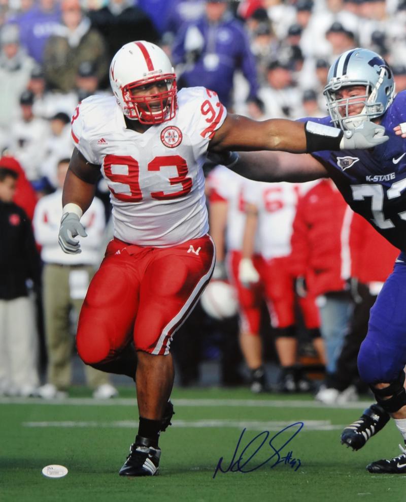 Ndamukong Suh Autographed Nebraska 16x20 Stiff Arm Photo- JSA Authenti –  The Jersey Source