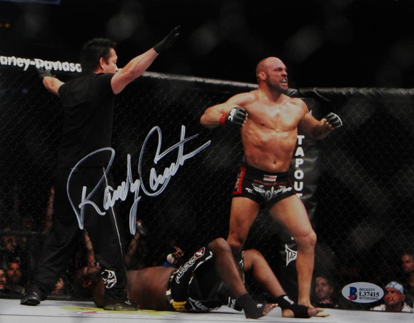 Randy Couture Autographed UFC 8x10 Photo Knock Out- Beckett Auth *White Ref Facing Couture