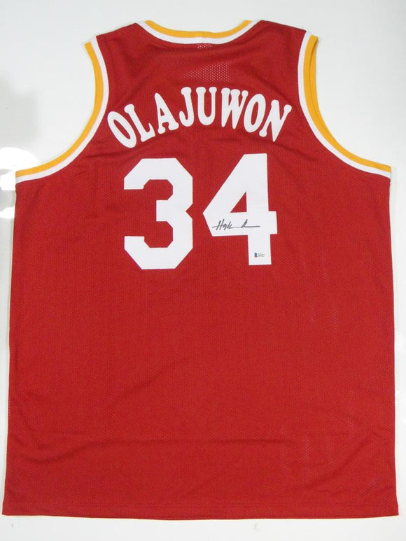 Hakeem Olajuwon Autographed Red Clutch City Jersey- Beckett Auth *4