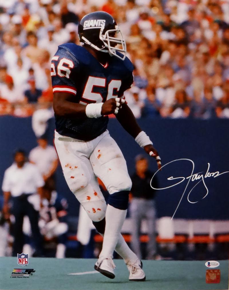 Lawrence Taylor Autograph Photo Blue Uniform Spotlight 23×27 New England  Picture Authentication