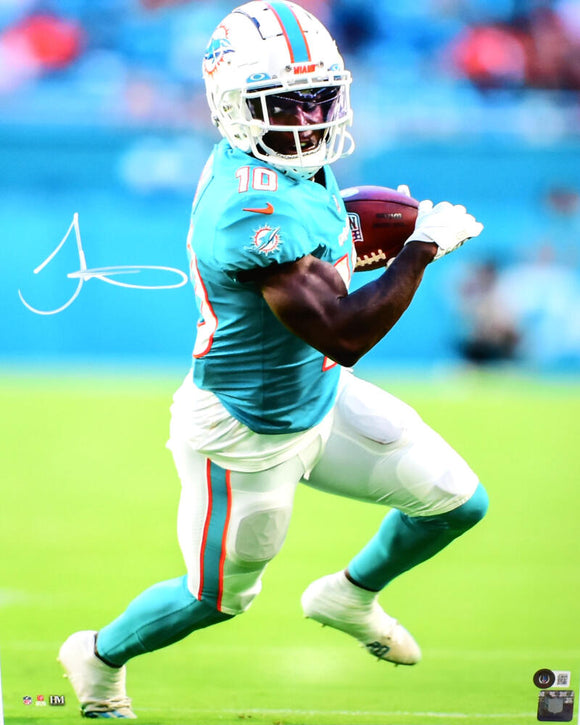 Tyreek Hill Autographed Miami Dolphins 16x20 Teal Jersey Photo- Beckett W Hologram *White Image 1