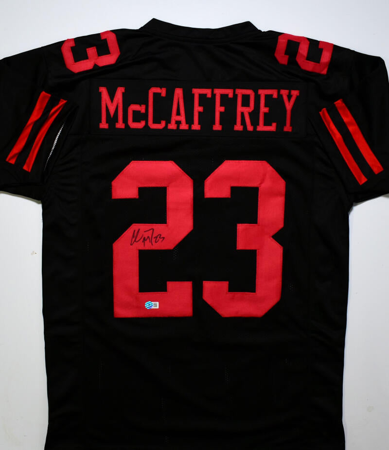 Christian McCaffrey Autographed Black Pro Style Jersey- Beckett Hologr –  The Jersey Source