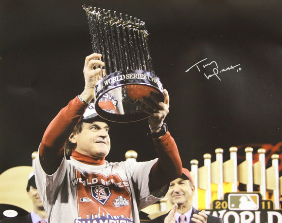 Tony LaRussa Autographed 16x20 Holding WS Trophy Photo- JSA Authenticated