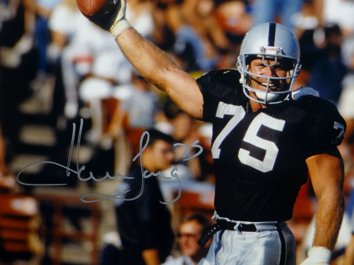 Howie Long Autographed Raiders 16x20 Holding Ball Photo- JSA Witnessed –  The Jersey Source