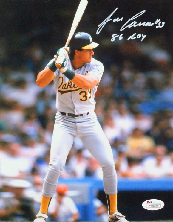 Jose Canseco Autographed Oakland 8x10 Swinging Photo W/ 86 ROY- JSA W *White