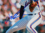 Doc Gooden Autographed NY Mets 8x10 Pitching Photo- Beckett W Hologram *Blue