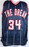 Hakeem Olajuwon Autographed Blue Pro Style Jersey- Beckett W Hologram *Black