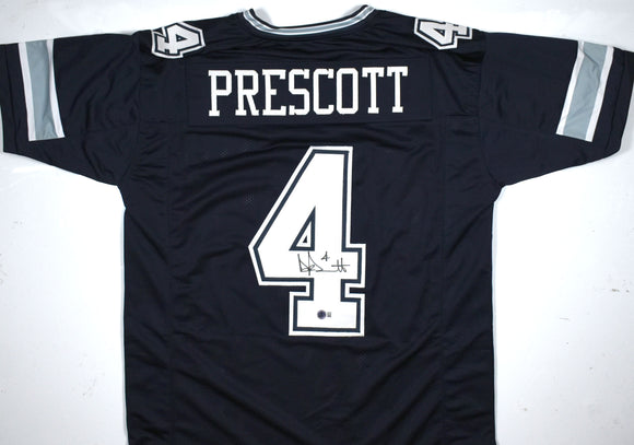 Dak Prescott Autographed Blue Pro Style Jersey - Beckett W Hologram *Black