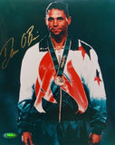 Dan O'Brien Autographed 8x10 With Medal Photo- TriStar Authenticated