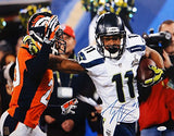 Percy Harvin Autographed 16x20 Super Bowl Stiff Arm Photo- JSA W Authenticated