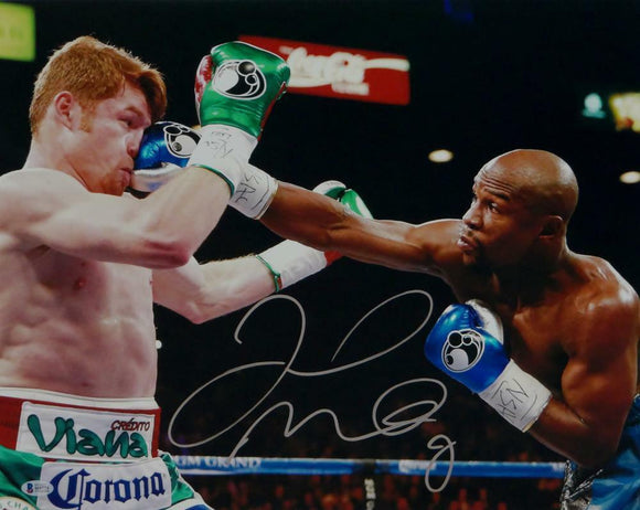 Floyd Mayweather Autographed 16x20 vs Canelo Alvarez Photo- Beckett Auth *Silver