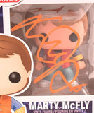 Michael J. Fox Autographed Marty in Future Funko Pop Figurine #49- JSA W *Orange