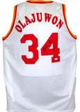 Hakeem Olajuwon Autographed White Jersey- JSA Witnessed *Black