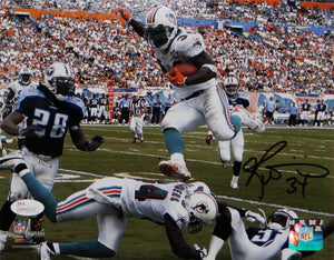 Ricky Williams Autographed Miami Dolphins 8x10 Jumping PF Photo- JSA W Auth *Blk