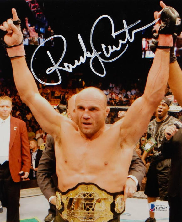 Randy Couture Autographed UFC 8x10 Photo With Belt- Beckett Auth *White
