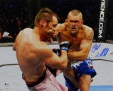Chuck Liddell Autographed UFC 16x20 Landing Punch Photo- Beckett Auth *Blue