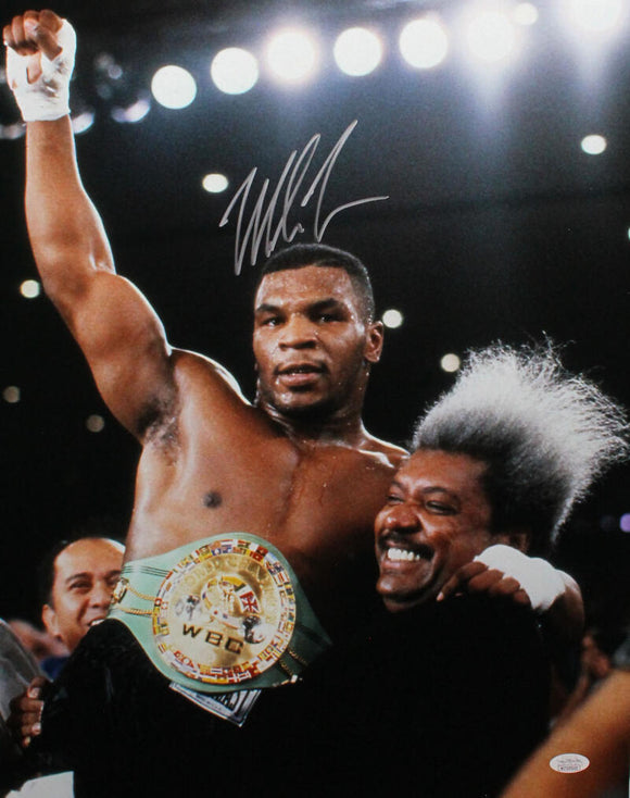 Mike Tyson Autographed 16x20 With Belt Photo- JSA W Auth *Silver
