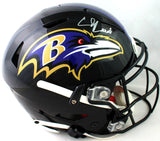 Ed Reed Autographed Baltimore Ravens F/S SpeedFlex Authentic Helmet - Beckett W Auth *Silver