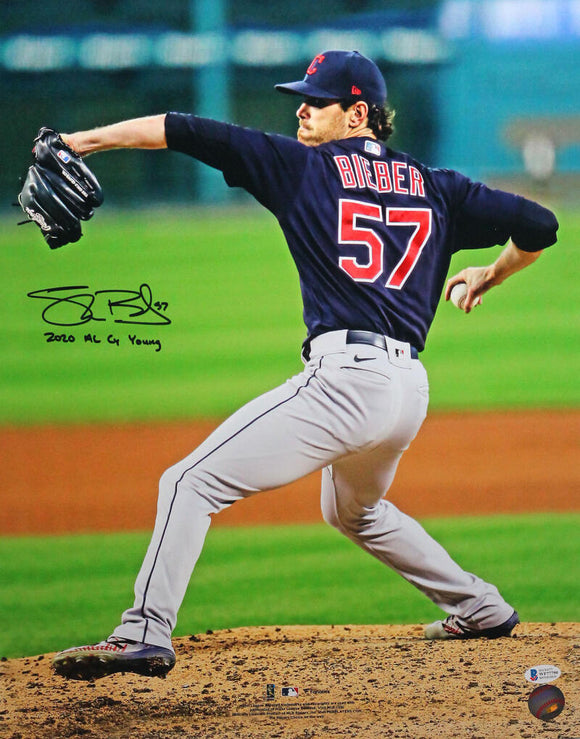 Shane Bieber Autographed Cleveland Indians 16X20 FP Pitching w/Insc - Beckett W Auth *Black