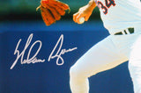 Nolan Ryan Autographed TX Rangers 8x10 Pitching Photo- AIV Hologram / Ryan Holo *Silver
