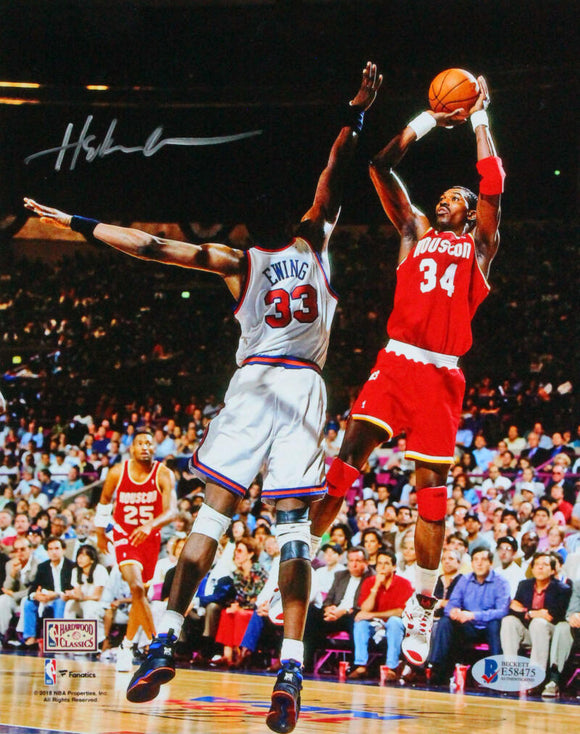 Hakeem Olajuwon Autographed Houston 8x10 Against Ewing Photo- Beckett *Silver