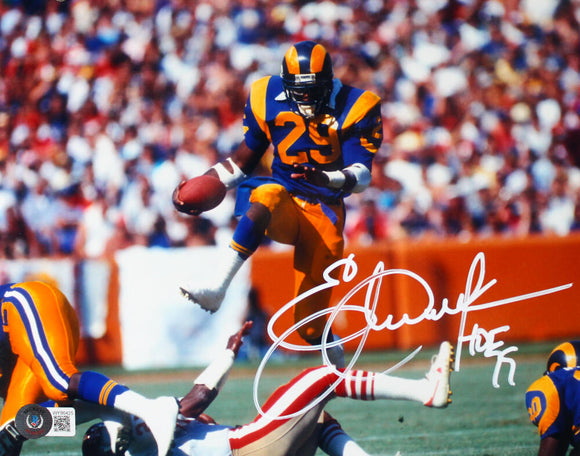 Eric Dickerson Autographed Los Angeles Rams 8x10 Leap W/HOF-Beckett W Hologram *White Image 1