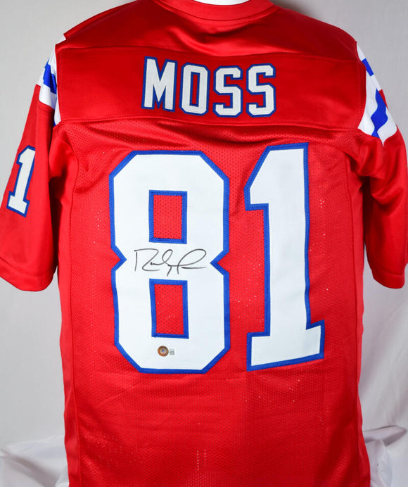 Randy Moss Autographed Red New England Jersey - Beautifully Matted and  Framed - Hand Signed By Moss and Certified Authentic by Beckett - Includes  Certificate of Authenticity at 's Sports Collectibles Store