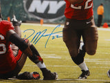 Doug Martin Autographed 16x20 Vertical Running Photo- JSA W Authenticated