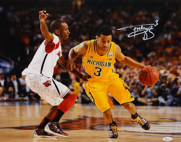 Trey Burke Autographed 16x20 Dribbling Photo-JSA W Authenticated