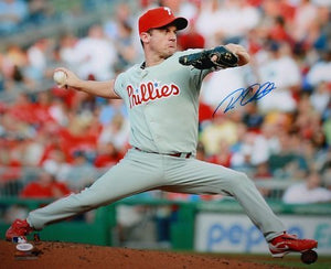 Roy Oswalt Autographed 16x20 Phillies Pitching Photo- JSA Authenticated