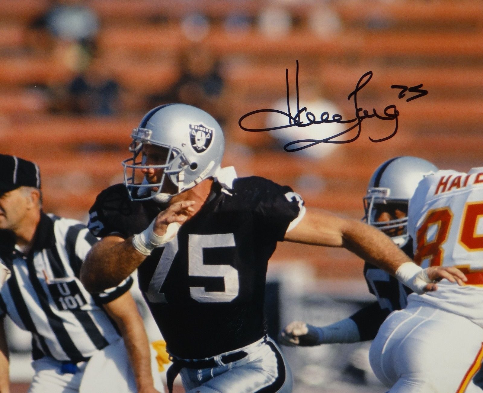 Howie Long Autographed *Black Raiders 16x20 Against Chiefs Photo- JSA – The  Jersey Source