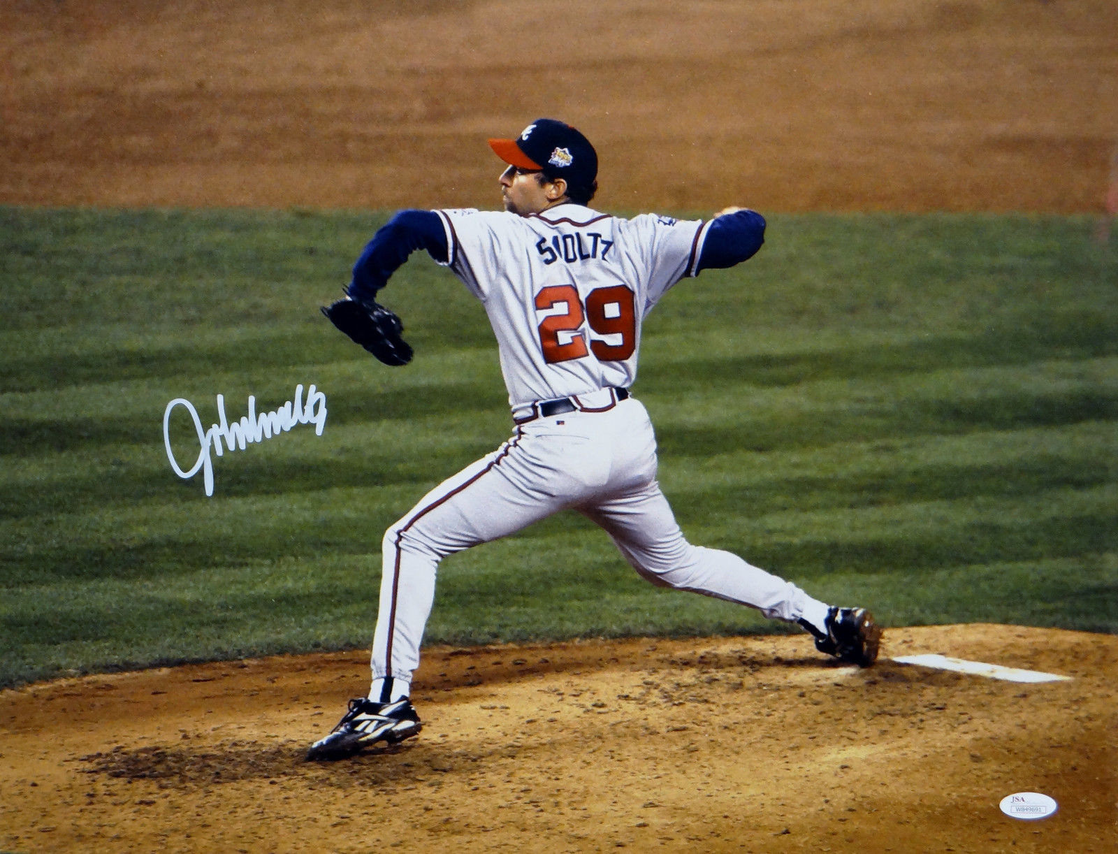 Framed John Smoltz Atlanta Braves Autographed 16 x 20 White Jersey  Pitching Photograph