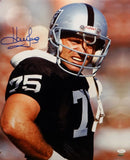 Howie Long Autographed Raiders 16x20 Standing Photo- JSA W Authenticated